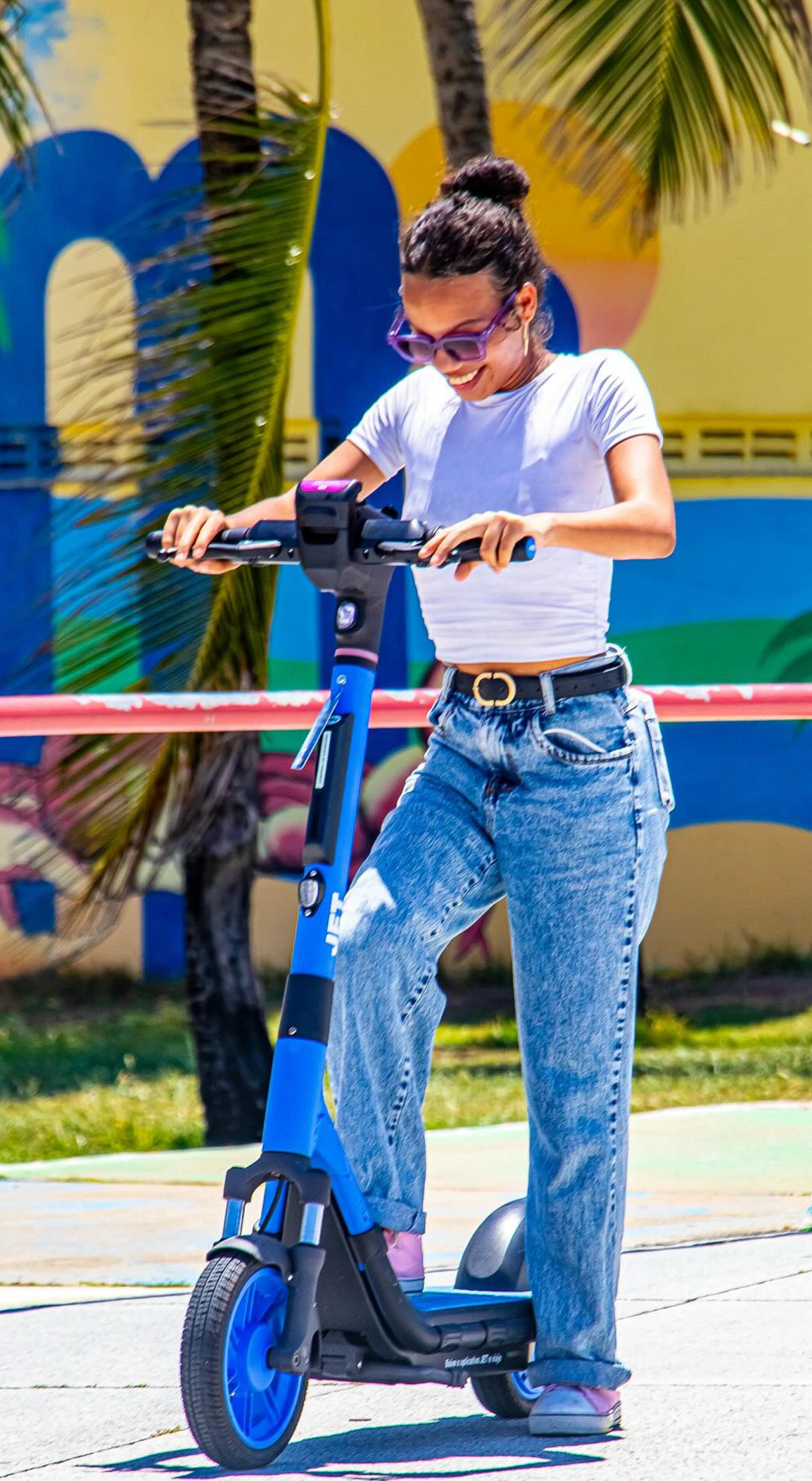 A rider on a JET e-scooter